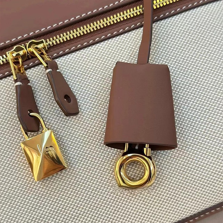 Borsa a tracolla originale, cerniera in pelle, pelle in microfibra, fibbia obliqua dorata_voghion.com