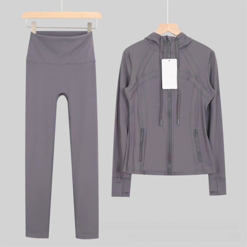 Dames yoga-outfit met capuchon, bestaande uit een 9-punts legging en een slim fit jasje, casual sportkleding voor workouts en dagelijks gebruik._voghion.com