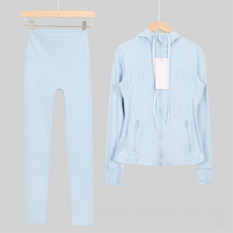 Dames yoga-outfit met capuchon, bestaande uit een 9-punts legging en een slim fit jasje, casual sportkleding voor workouts en dagelijks gebruik._voghion.com