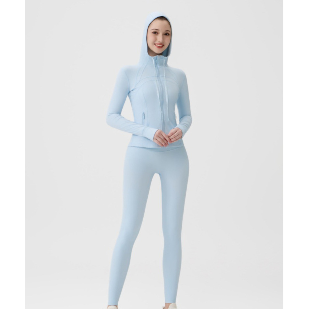 Dames yoga-outfit met capuchon, bestaande uit een 9-punts legging en een slim fit jasje, casual sportkleding voor workouts en dagelijks gebruik._voghion.com