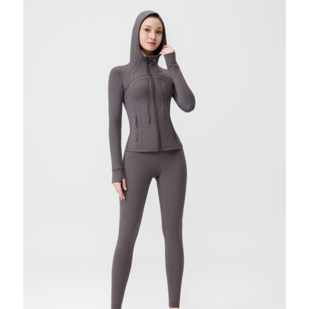Dames yoga-outfit met capuchon, bestaande uit een 9-punts legging en een slim fit jasje, casual sportkleding voor workouts en dagelijks gebruik._voghion.com