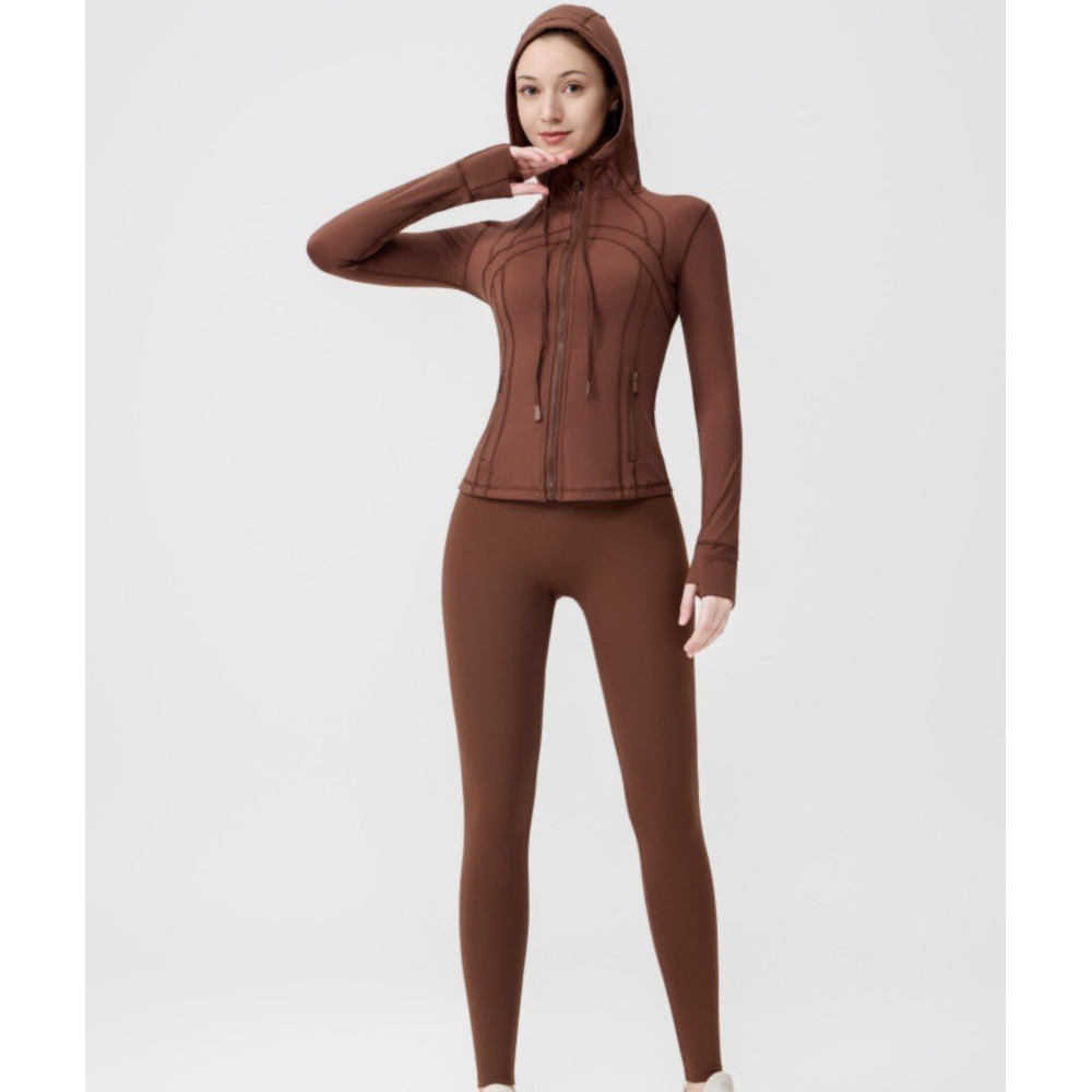 Dames yoga-outfit met capuchon, bestaande uit een 9-punts legging en een slim fit jasje, casual sportkleding voor workouts en dagelijks gebruik._voghion.com