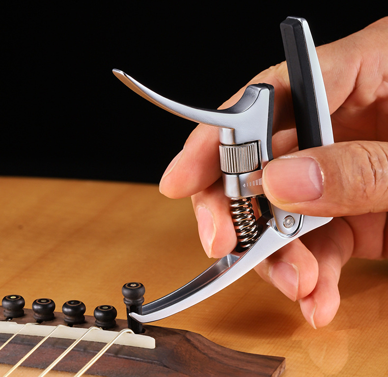 Capotraste universal para violão folk clássico e elétrico_voghion.com