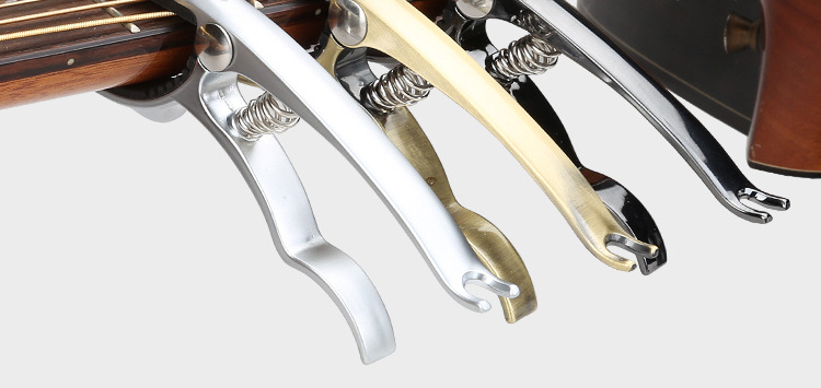 Accessori per chitarra ukulele elettrica Jaguar Folk: capotasto per accordatura_voghion.com