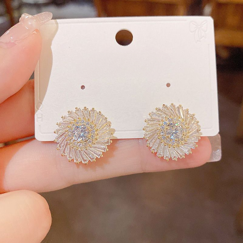 Pendientes de aro con girasol en plata de ley estilo moderno_voghion.com