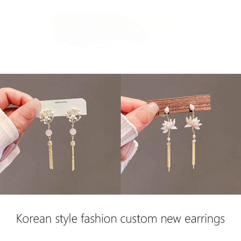Neue, einzigartige Ohrringe im chinesischen Magnolienblüten-Stil, beliebtes neues Modell 2025, exklusive Nischenohrringe für Damen, leicht_voghion.com
